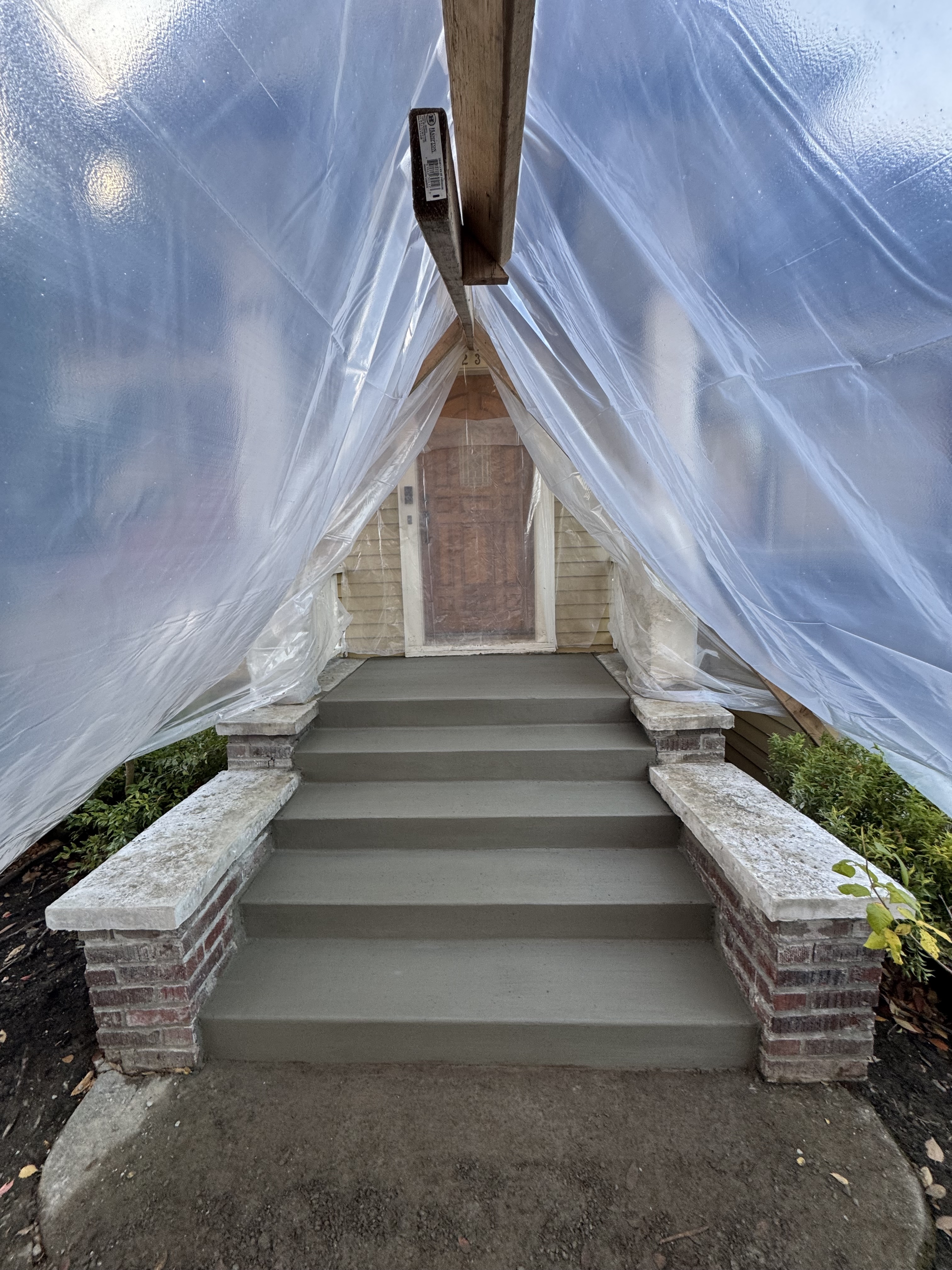 Finished concrete stairs under protective tent